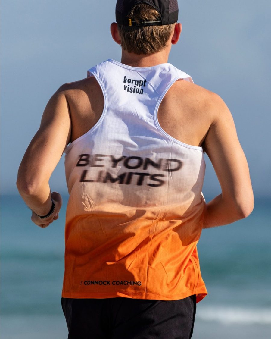 Back of the Beyond Limits race singlet with the BEYOND LIMITS wordmark and T Connock Coaching